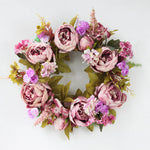 couronne florale vintage rose blanche feuilles vertes fleurs artificielles intérieur mariage table porte