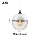suspension lumineuse moderne pendentif verre noir transparent contemporain fixation câble luminaire salle manger chambre