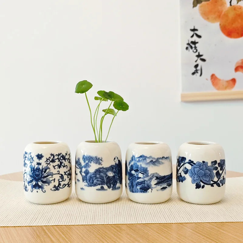 vase céramique blanc bleu fleurs stylisées artisanal traditionnel décoration intérieure pot fleurs