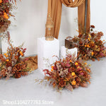 décoration événement mariage arc floral composition feuilles branches rustique automnale