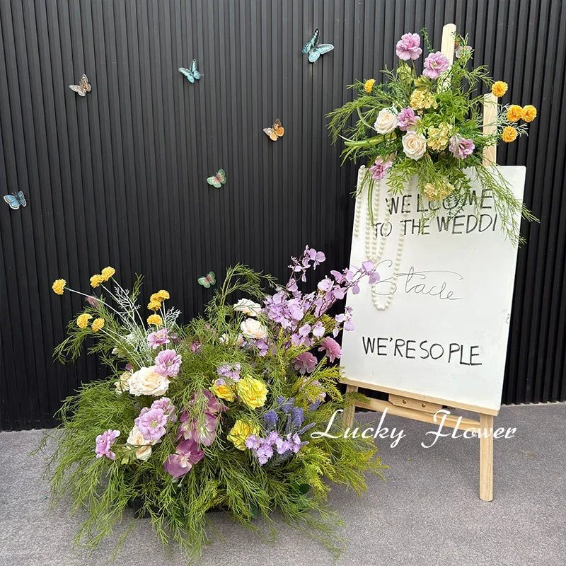 décoration murale naturelle composition florale variée couleurs vives rustique bienvenue mariage