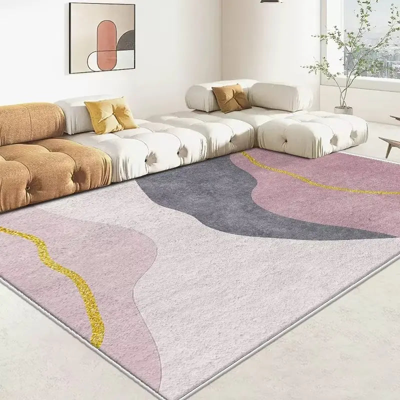 Intérieur moderne avec canapé confortable et tapis géométrique aux couleurs pastel.