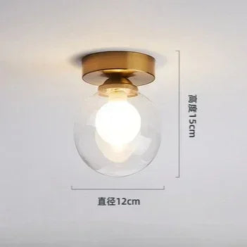 lampe moderne verre transparent noir doré élégante sphérique éclairage contemporain