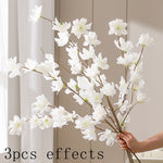 décoration intérieure bouquet fleurs artificielles rose naturel blanc orange rouge bleu vase minimaliste