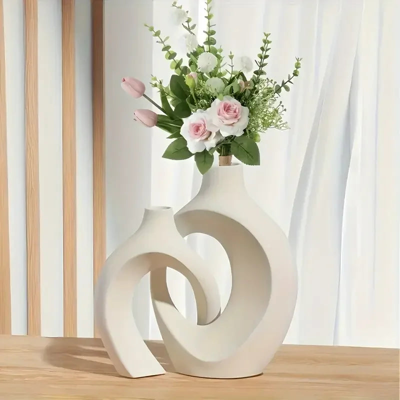 vases decoratifs blancs modernes abstraits incurves fleurs artificielles salon deco minimaliste sculptural