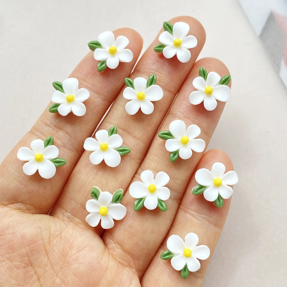 bijoux décoration ongles nail art fleurs colorées résine minimalistes blanc rose bleu vert jaune