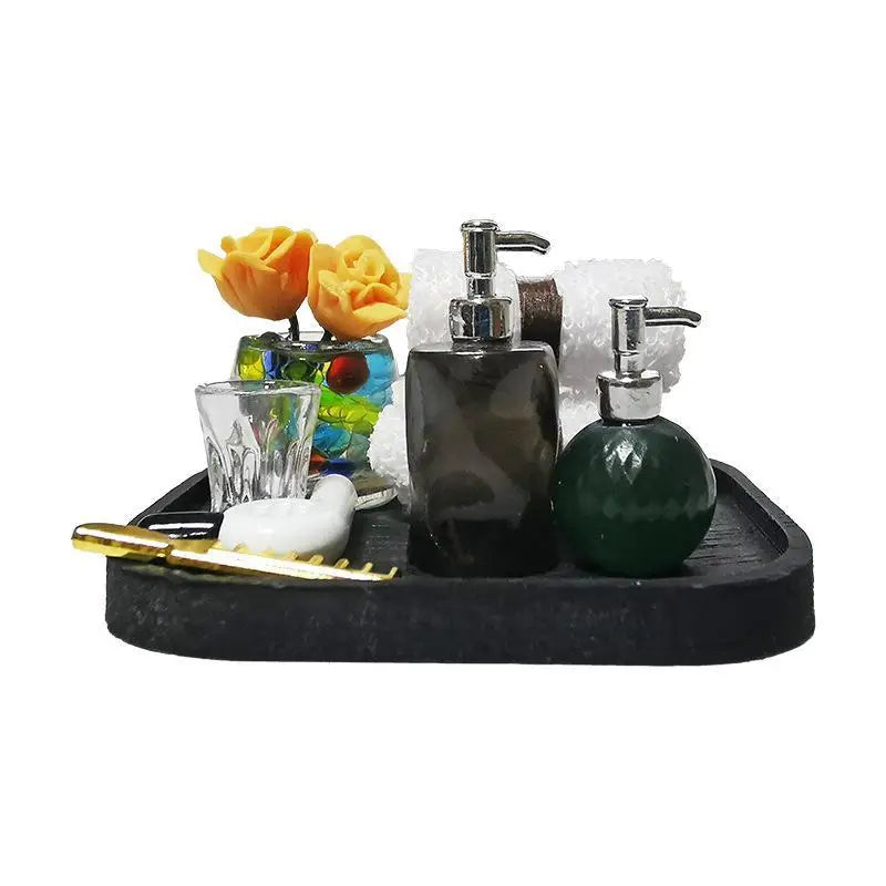 ensemble toilettes miniature résine moderne brosse dorée serviette blanche distributeur savon noir gel douche