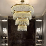 chandelier cristal moderne doré suspension cristaux prismes luxueux transparent multiples formes