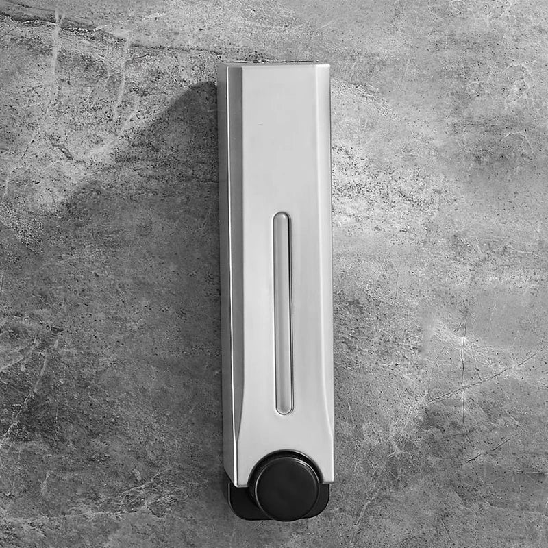 distributeur savon liquide mural noir moderne tuyau débit bouton déclenchement minimaliste salle bain