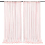 Paire de rideaux longs et légers dans une couleur rose pastel, parfaits pour embellir une pièce avec une touche douce et élégante.