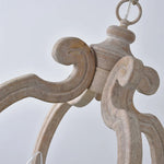 suspension lumineuse bois ornements sculptés finition rustique classique vintage blanc beige salle manger restaurant