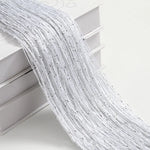rideau pailleté franges brillantes moderne transparent blanc argenté chambre hotelDecoration festive fil métallique polyester