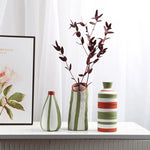 vase moderne céramique rayures vert blanc rouge table décoration fleurs artificielles maison étude
