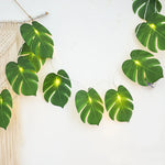 guirlande feuilles vertes led festives decoration feuille monstera lumiere jaune deco mur plantes artificielles