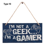 plaque décorative bois graphique texte jeu manette humoristique corde noire bleue adolescente chambre