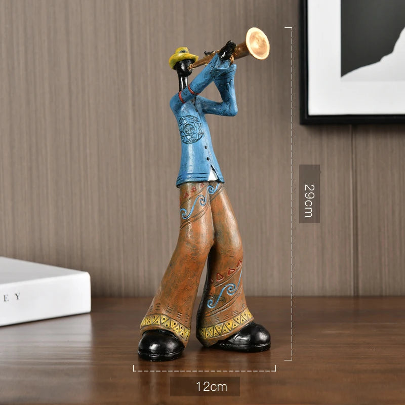 statues musiciens saxophone trompette ethniques motifs floraux bleu marron orange gris