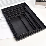 assiettes plastique texture bois moderne noir grandes tailles rangement utilisation