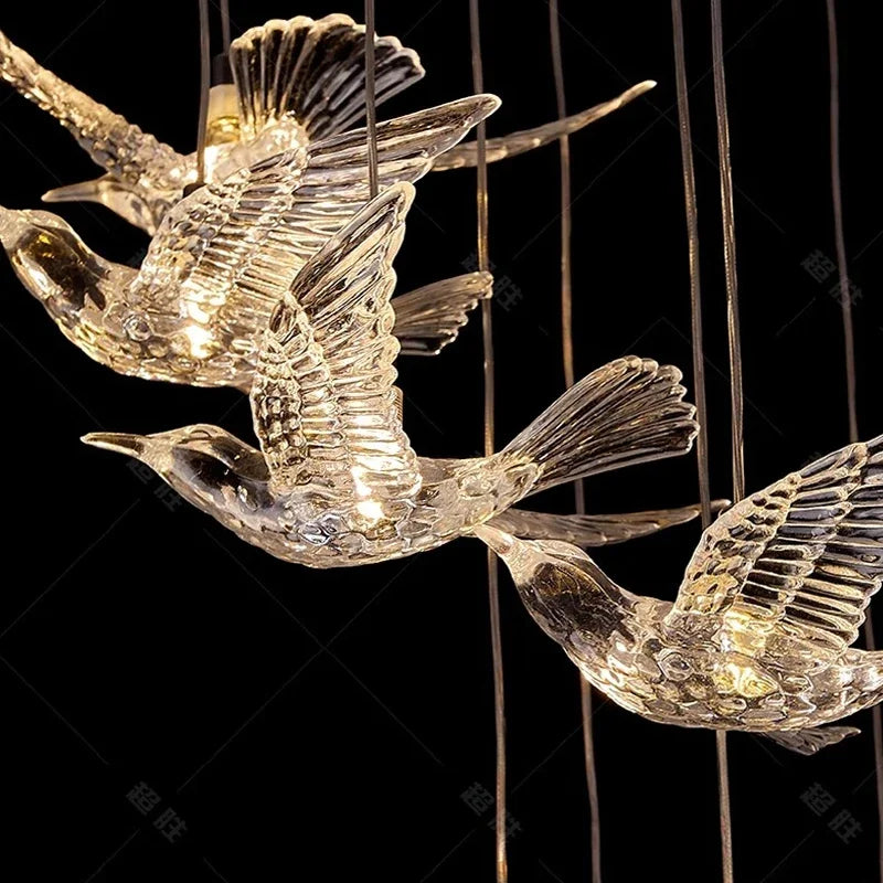 suspension lumineuse oiseaux transparente moderne contemporain lumière blanche salle manger chambre salon