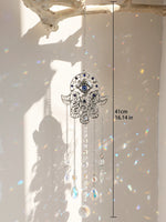 décoration jardin boho hamsa cristal prismes bleu argent transparent lumière capturante