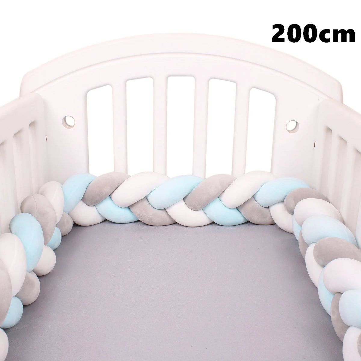 coussin noué bébé tissu doux texture tressée beige clair moderne confortable sécurité chambre anti