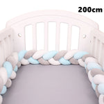 coussin noué bébé tissu doux texture tressée beige clair moderne confortable sécurité chambre anti