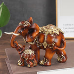 statue éléphant marron clair doré motifs ornements artisanat décoration intérieure chambre salon