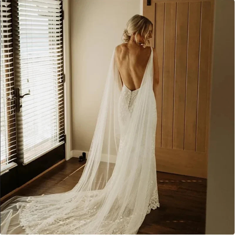 cape mariée dentelle blanche longue voile cathédrale élégante robe mariée