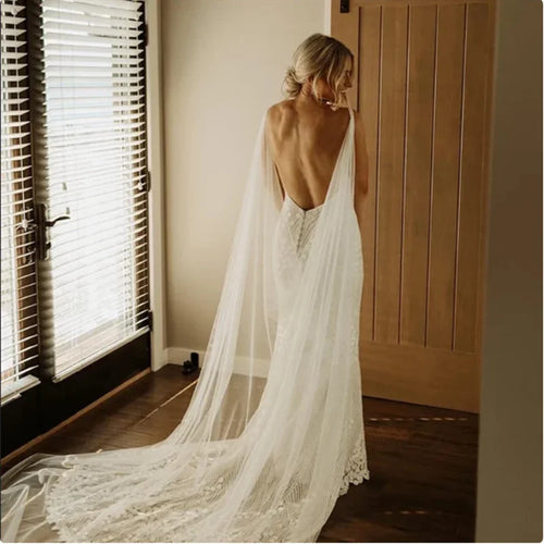 cape mariée dentelle blanche longue voile cathédrale élégante robe mariée