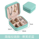 boîte rangement bijoux simili cuir vert clair rose pâle noir moderne pratique fermeture glissière