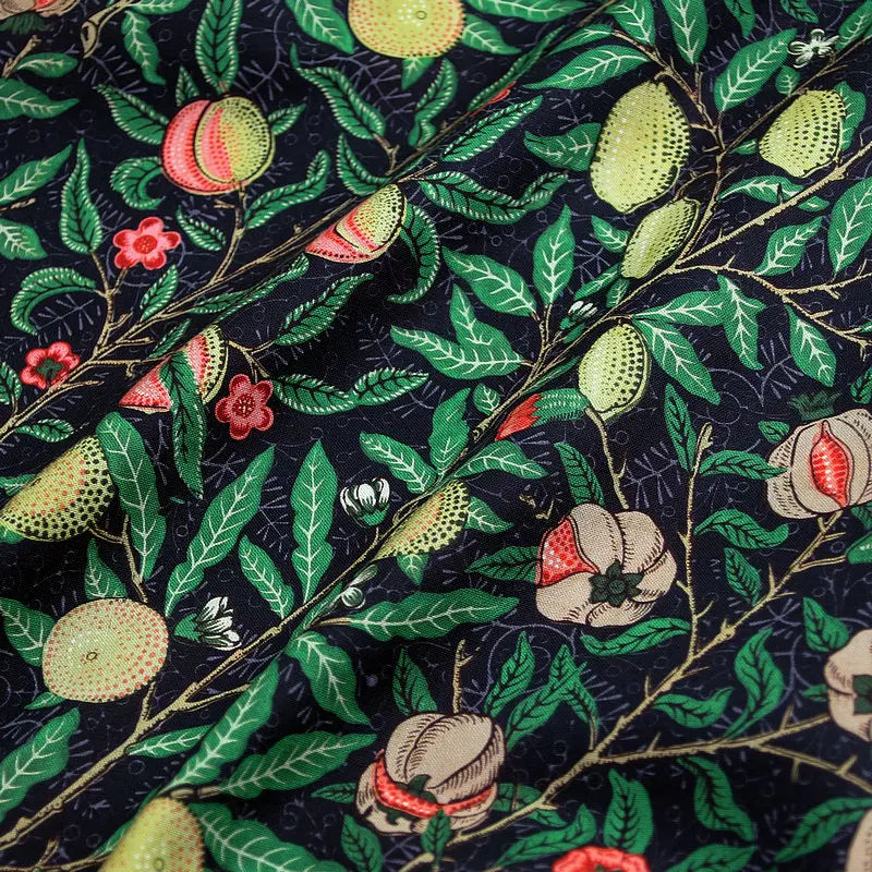 tissu coton imprimé floral motifs fruits pommes citrons couleurs vives noir bleu turquoise orange