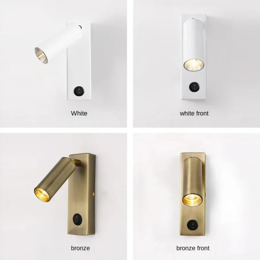 Lampe murale bronze dans un couloir avec éclairage directionnel