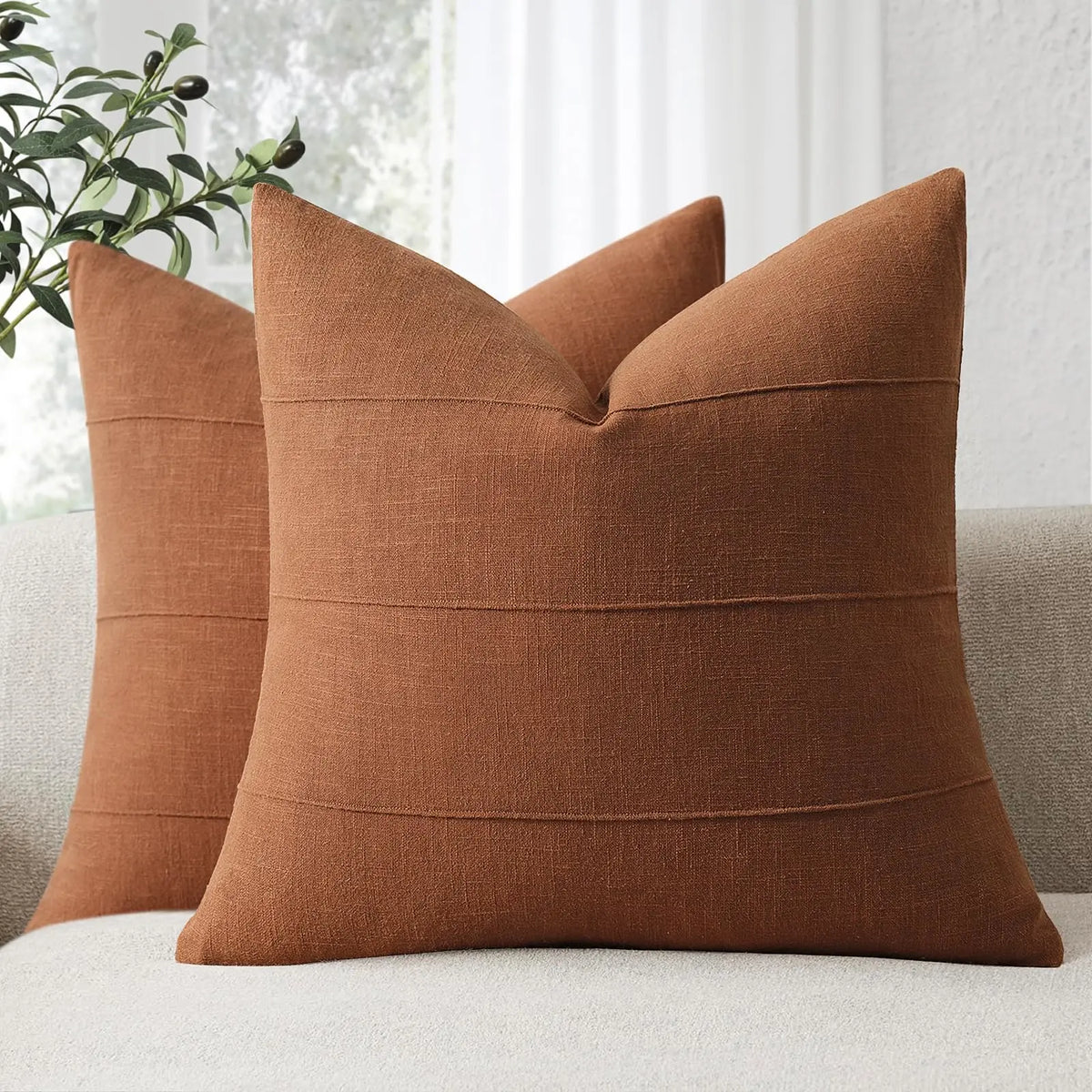 coussins décoratifs tissu texturé brun rouille beige bleu marine vert olive moderne minimaliste
