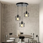 lustre industriel moderne lumières noir doré abat jour ajouré fixé