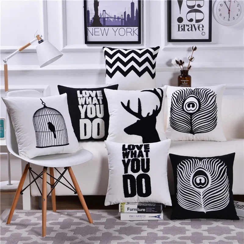 housse coussin coton noir blanc motifs géométriques animaux moderne minimaliste scandi