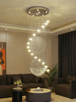 Suspension lumineuse moderne cristal transparente salon chambre étude 2000 82000 flux lumineux