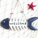 décoration murale plaque bois bleu marine squelette poisson corde bouées rouge bleu