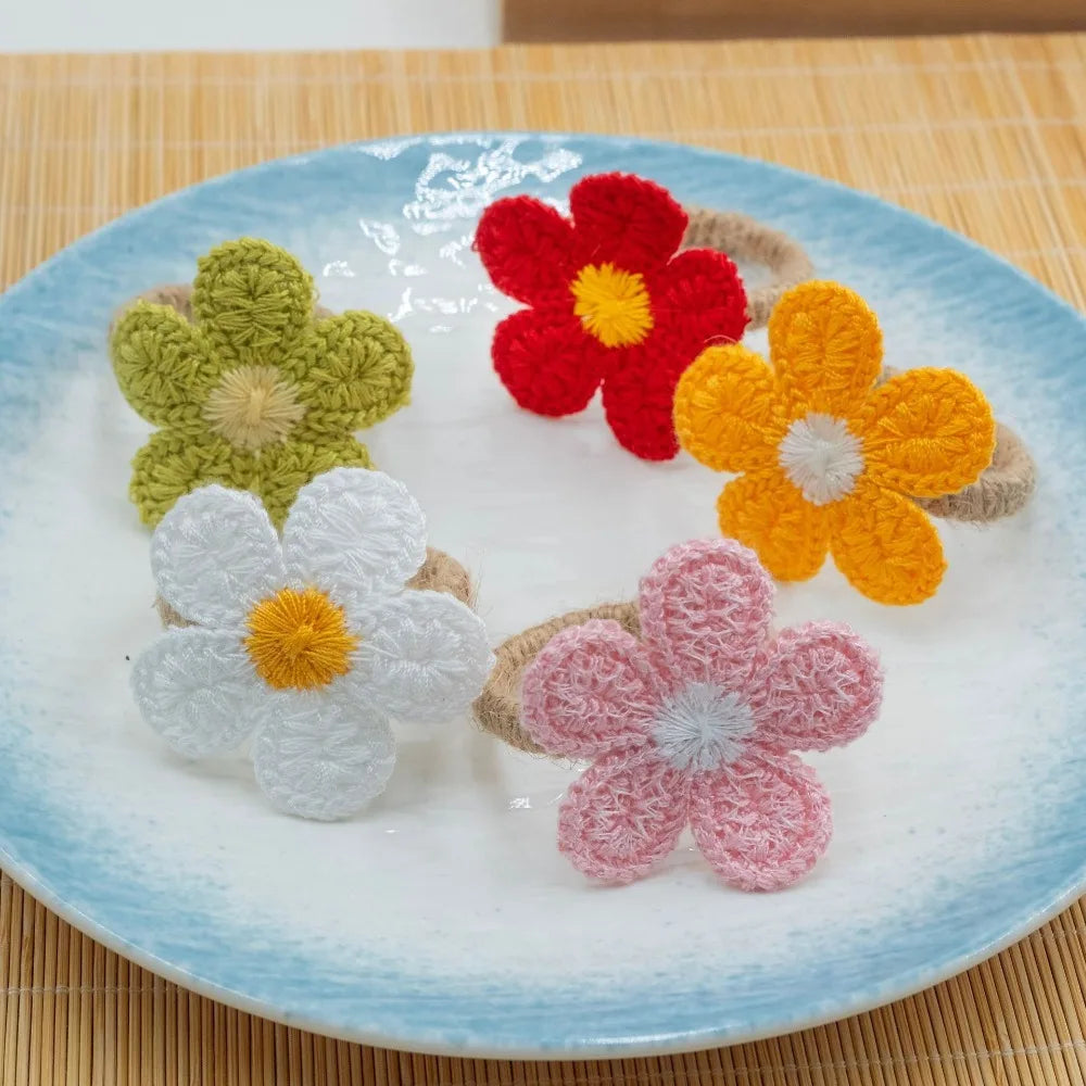 fleurs crochetées main artisanale tringle decoration table mariage pique nique brunch après midi thé