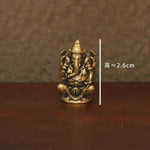 statues ganesha bronze doré sculptures détaillées motifs floraux traditionnel hindou maison