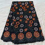tissu dentelle coton brodé fleurs motif broderie africaine voile suisse vêtement élégant