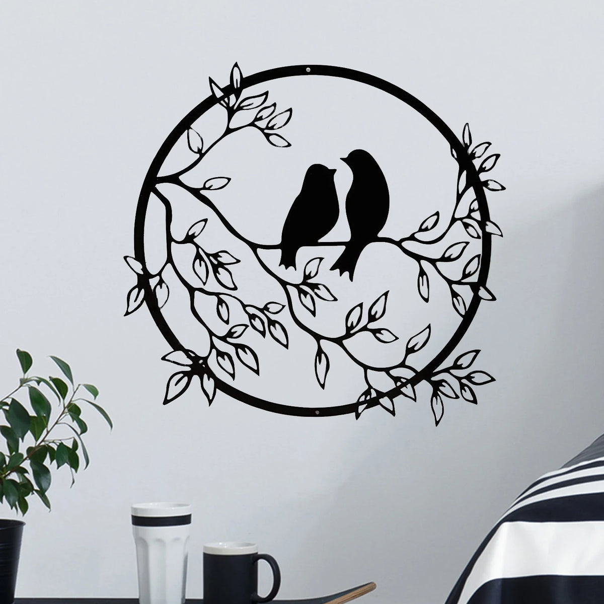 décoration murale oiseaux branche feuilles minimaliste noir contemporainintérieur ambiance paisible art mural robuste métal