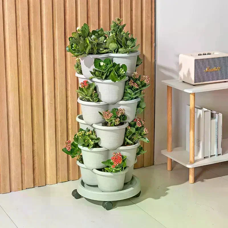 jardinière verticale empilable moderne pots intégrés fraises herbes aromatiques fleurs gris orange vert