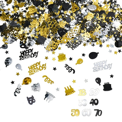 Confettis dorés dispersés sur table anniversaire élégante