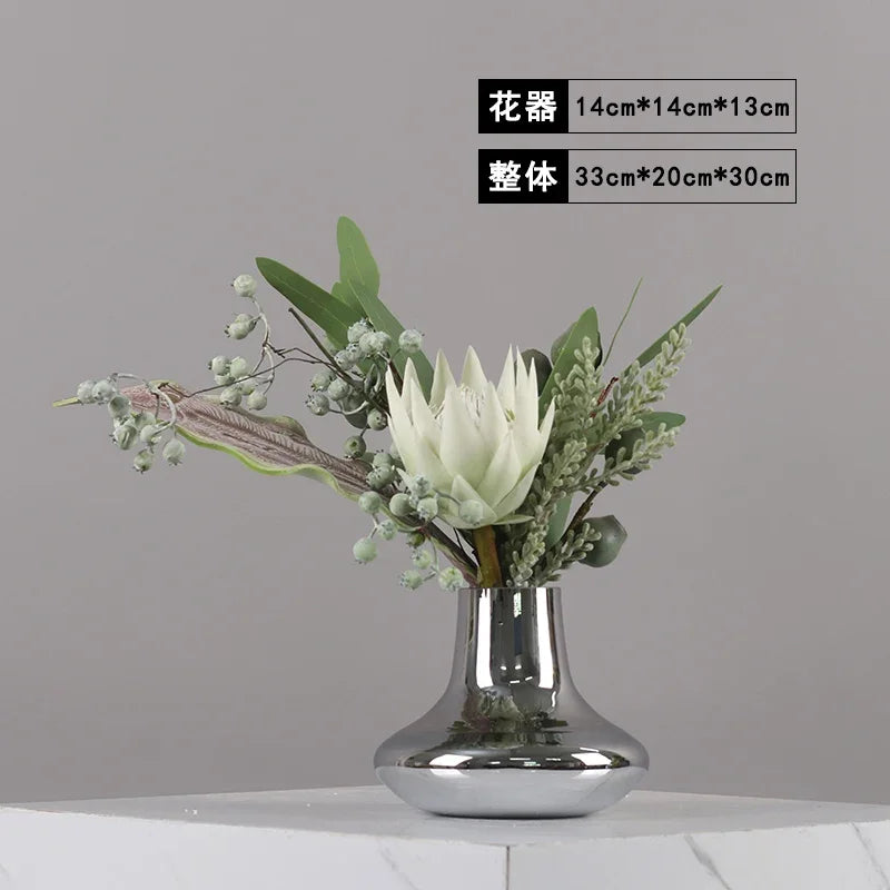 vase moderne argenté brillant fleurs artificielles blanches vertes décoration maison