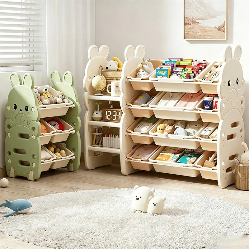 meuble rangement enfant moderne beige vert clair compartiments horloge cache lumière jouets divers plastique