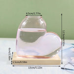 vase verre forme cœur transparent moderne plante verte support bois