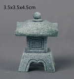 décoration table zen pierre miniature lanterne japonaise arbre branches mousse rocher gris vert traditionnelle