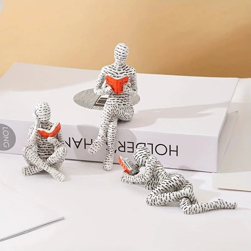statue résine moderne statuette penseur lecture livre rouge orange noir