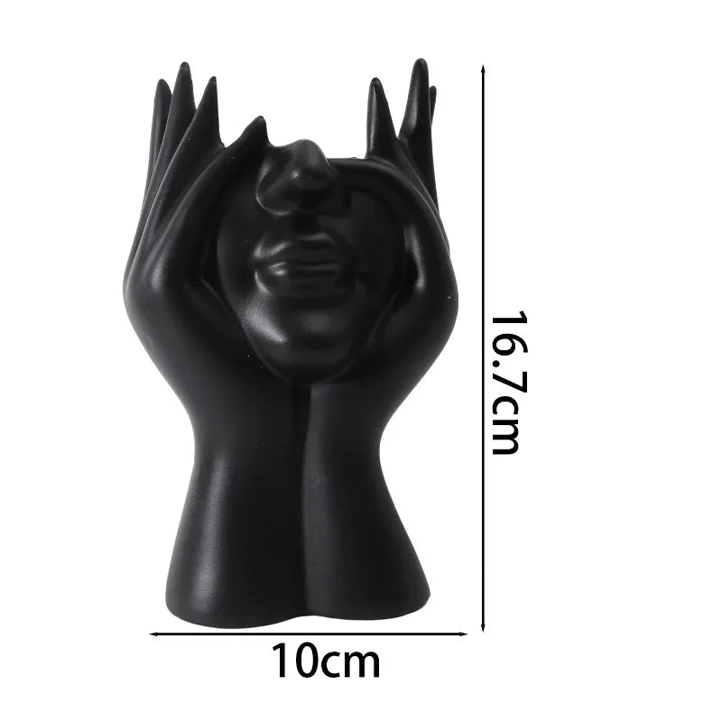 support pinceaux maquillage or argent noir visage stylisé moderne sculpturaliaux pinceaux