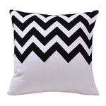 housse coussin coton noir blanc motifs géométriques animaux moderne minimaliste scandi