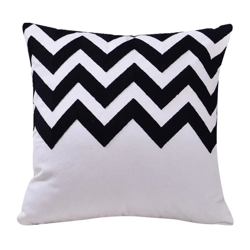 housse coussin coton noir blanc motifs géométriques animaux moderne minimaliste scandi